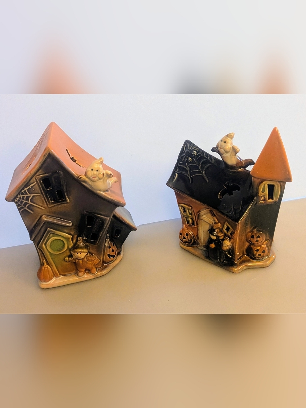 Set of 2 Glazed Ceramic Haunted House Halloween Decorations.Apprx 5" x 4" x 2.5